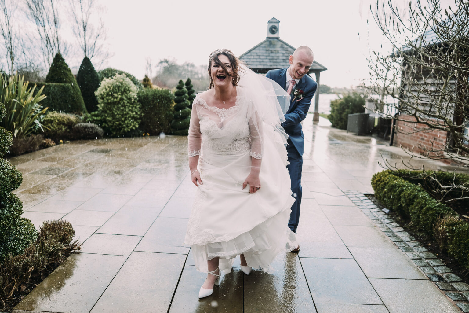 rain at winter wedding in Cheshire