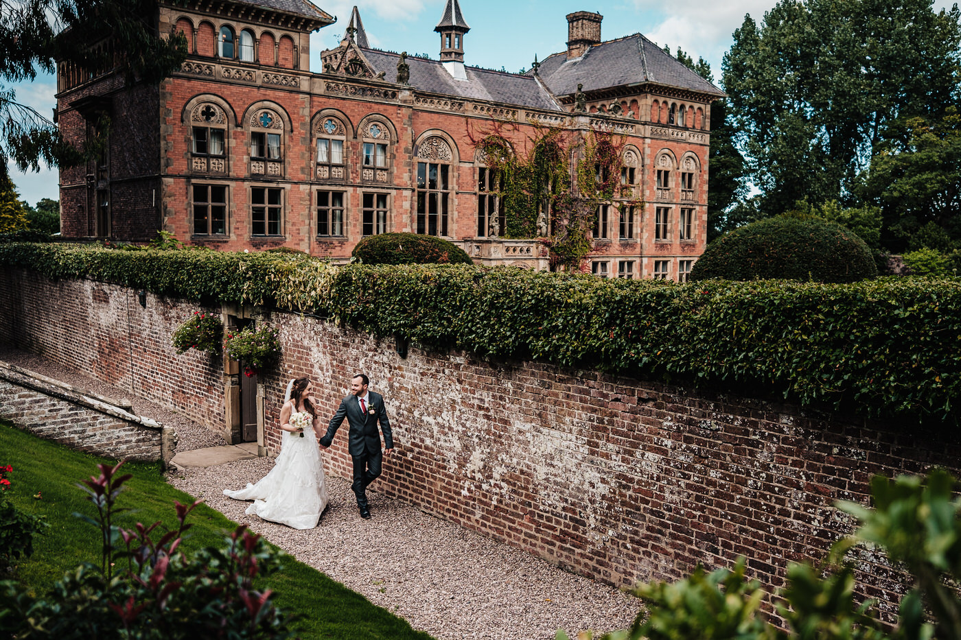 wedding portrait in front of soughton hall building